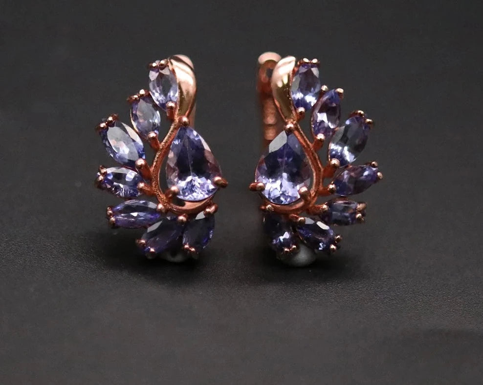 Tanzanite earrings, Natural gemstone, Clasp earrings, Precious gemstones, Fine jewelry, Tanzanite jewelry, Gemstone earrings, Luxury earrings, Sterling silver, December birthstone, Blue-violet gemstone, Statement jewelry, Elegant earrings, Rare gemstone, Handcrafted jewelry,