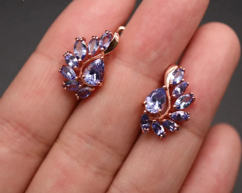 Tanzanite earrings, Natural gemstone, Clasp earrings, Precious gemstones, Fine jewelry, Tanzanite jewelry, Gemstone earrings, Luxury earrings, Sterling silver, December birthstone, Blue-violet gemstone, Statement jewelry, Elegant earrings, Rare gemstone, Handcrafted jewelry,