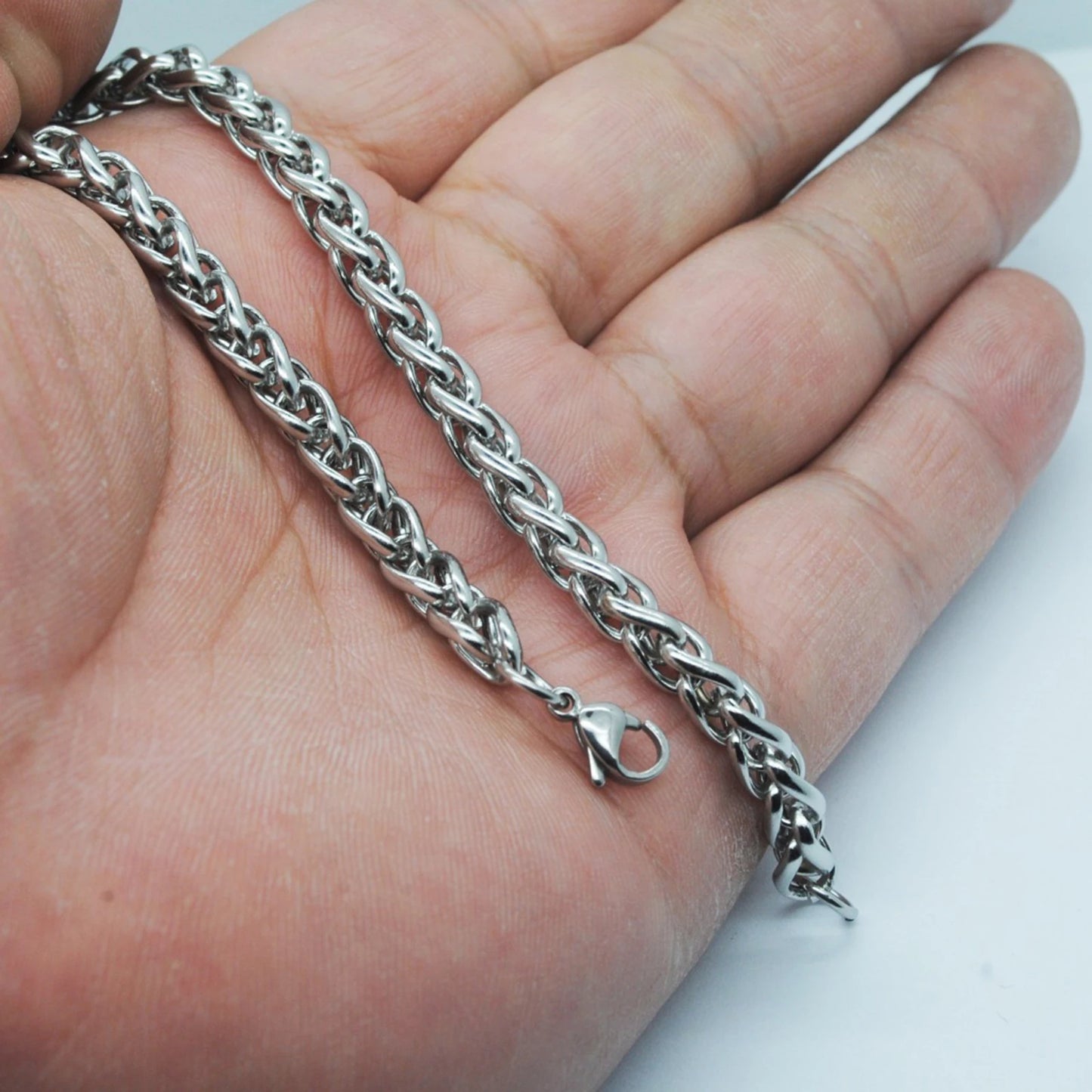 Bold stainless steel dragon link bracelet.