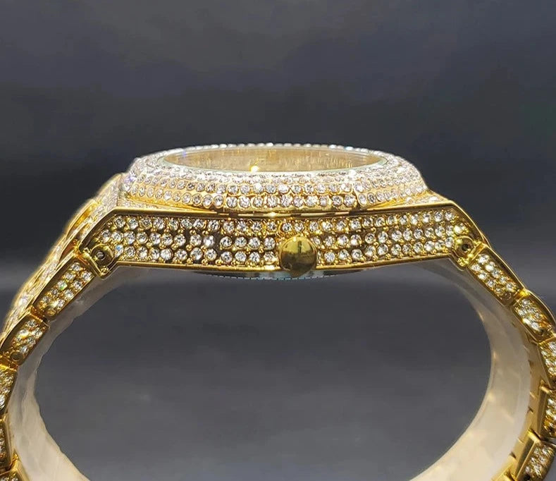 Luxury octagon gold diamond quartz watch.