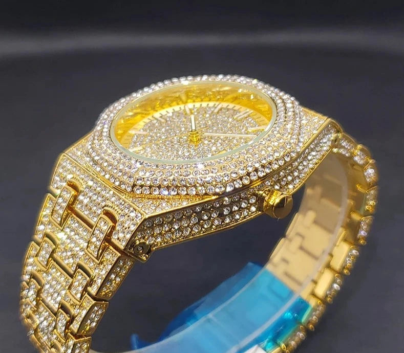 Luxury octagon gold diamond quartz watch.