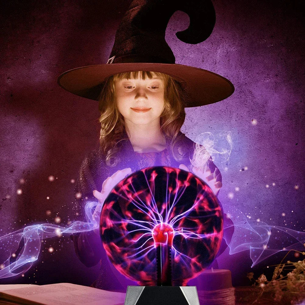 Child in witch hat gazing at 8-Inch Sound Control Magic Plasma Ball Lamp with glowing purple and pink light effects