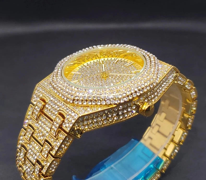 Luxury octagon gold diamond quartz watch.