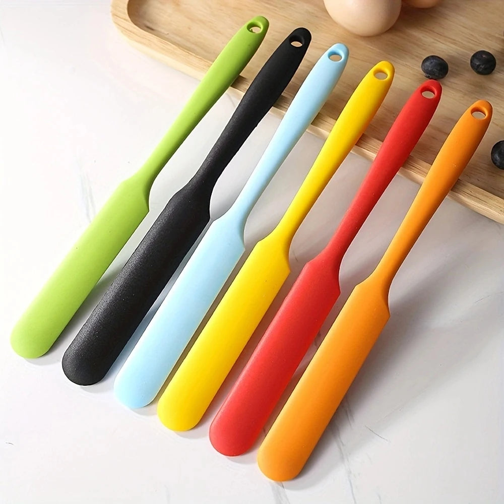 Silicone baking spatula, Non-stick spatula, Heat resistant kitchen tool, Silicone scraper, Baking utensil, Cake spatula, Cooking spatula, Flexible baking tool, Kitchen silicone spatula, Dishwasher safe spatula, Food-grade silicone scraper, Heat-proof baking spatula, Silicone mixing spatula, Cake decorating tool, Non-stick baking utensil,