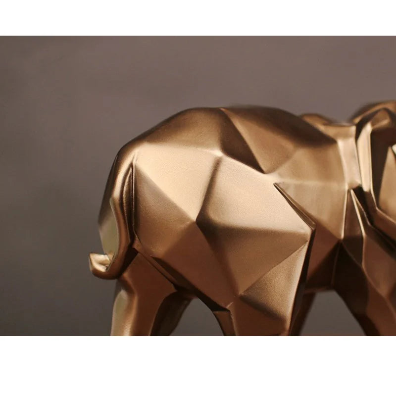 Geometric, Resin, Gold, Elephant, Sculpture, Modern, Decor, Art, Home accents, Animal sculpture, Contemporary design, Metallic finish, Decorative figurine, Handcrafted, Unique centerpiece,