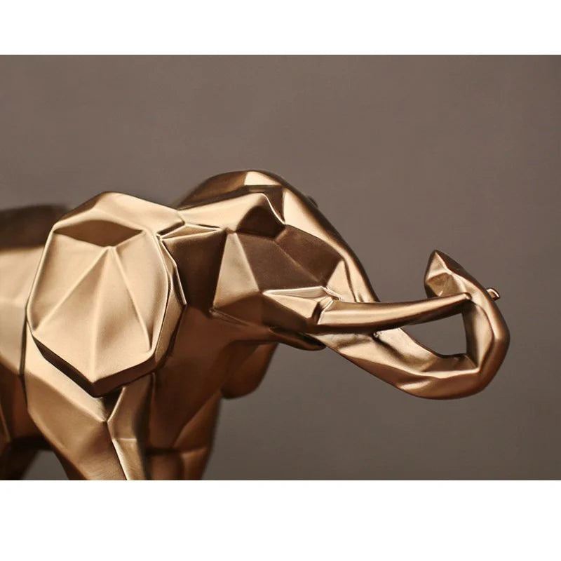 Geometric, Resin, Gold, Elephant, Sculpture, Modern, Decor, Art, Home accents, Animal sculpture, Contemporary design, Metallic finish, Decorative figurine, Handcrafted, Unique centerpiece,