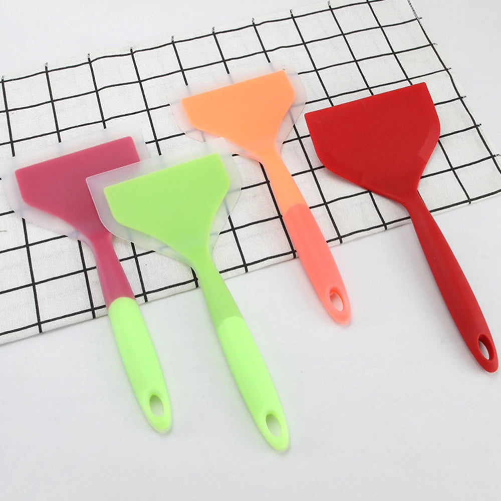 Silicone spatula, Non-stick spatula, High temperature resistant, Food grade silicone, Heat resistant spatula, Kitchen utensil, Cooking tool, Frying spatula, Flexible spatula, Safe cooking, Easy clean spatula, Ergonomic handle, Silicone kitchenware, Dishwasher safe, Cooking essentials,